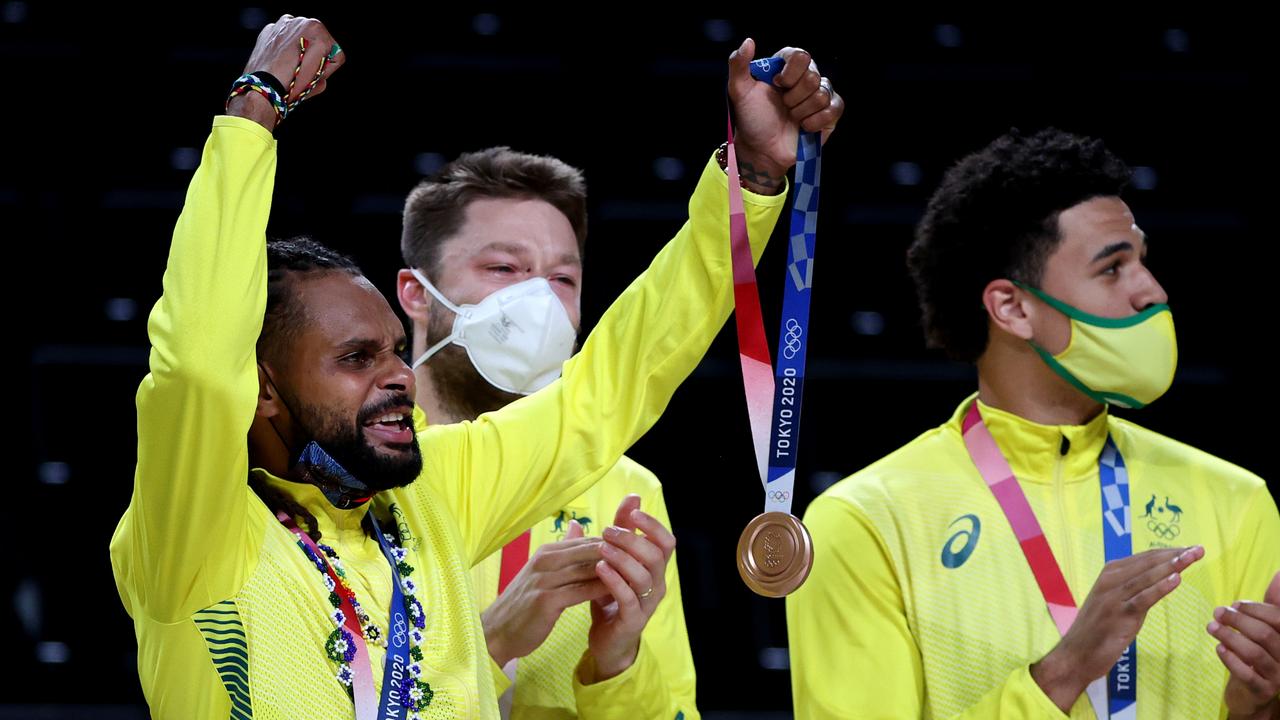 Patty Mills of Team Australia celebrates with his bronze medal. (Photo by Kevin C. Cox/Getty Images)