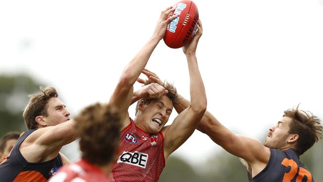 Swan Jordan Dawson takes a big mark in a practice match against the Giants.