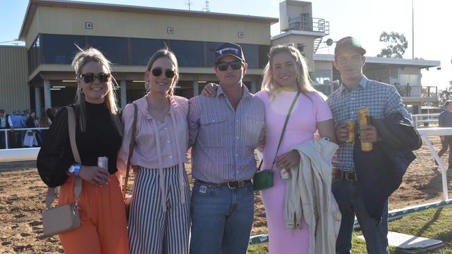 Spectators cheer on as they watch the B Grade St George vs Condamine match at the Roma Rugby Races at Bassett Park. Picture: Chloe Cufflin.
