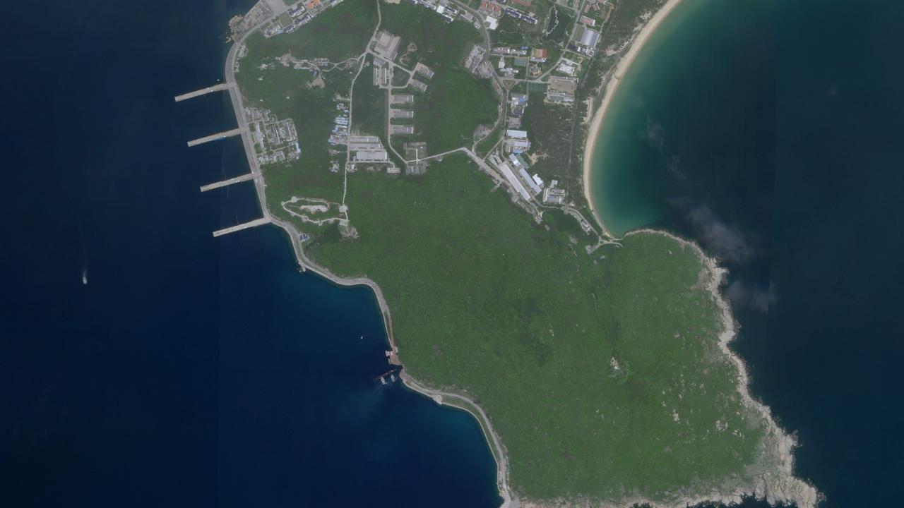 An August 18, 2020, satellite image reportedly shows a Chinese Type 093 nuclear-powered attack submarine entering a tunnel into the underground Yulin Naval Base on Hainan Island in the South China Sea. Picture: Planet Labs/AFP