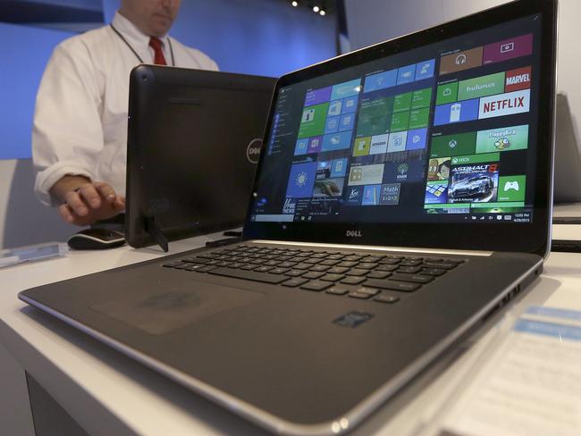 FILE - In this April 29, 2015, file photo, a Dell laptop computer running Windows 10 is on display at the Microsoft Build conference in San Francisco. In a statement issued to the BBC on May 24, 2016, Microsoft denied claims that it was forcing users of older Windows versions to upgrade to Windows 10. (AP Photo/Jeff Chiu, File)