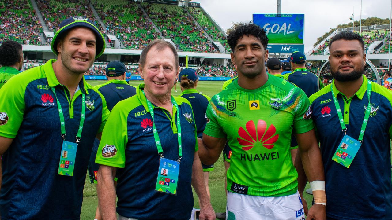 Peter Mulholland with Raiders players Michael Oldfield, Sia Soliola and Dunamis Lui.