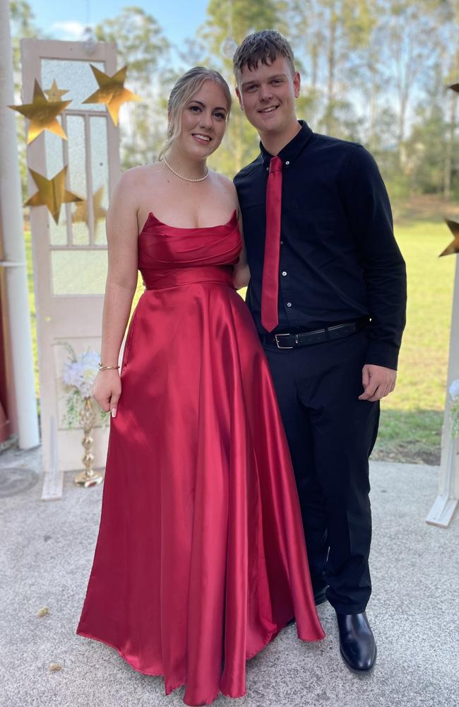 Olivia Grant and Mason arrive at the 2024 Gympie State High School graduation formal.