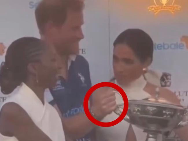 Meghan Markle appeared to ask a woman not to stand next to Prince Harry.