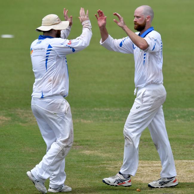 Townsville A Grade Cricket grand final between Brothers and Norths at Riverway Stadium. Brothers Justin Rawlins takes the wicket of Josh De Munari. Picture: Evan Morgan