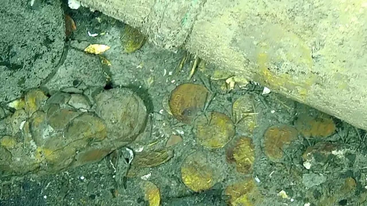 What appears to be gold coins in the shipwrecked galleon San Jose. Picture: Colombian National Navy