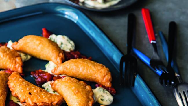 Spiced lamb empanadas with tomato chutney and basil mayo. Picture: Nikki To