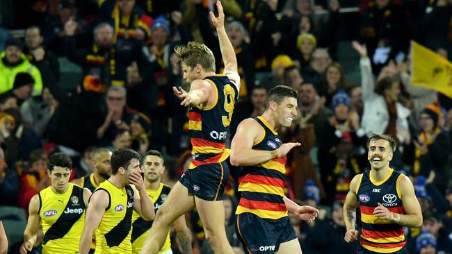 Adelaide’s Rory Sloane celebrates a goal with Crows forward Josh Jenkins in the win against Richmond. Picture: AAP Image/Sam Wundke