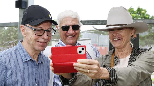 Member for Kennedy Bob Katter has a selfie taken with Edmonton voters Grieg Warriner and Naomi Warriner at the AEC polling booth at the Edmonton PCYC on Saturday morning. Picture: Brendan Radke