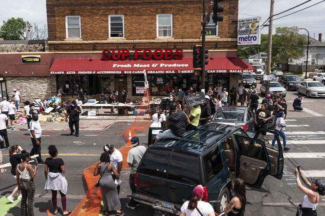 Protesters gather outside the Cup Foods on Chicago Avenue, Minneapolis. Picture: AP