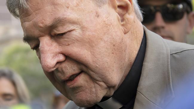 Cardinal George Pell arrives at the County Court in Melbourne yesterday. Picture: Andy Brownbill/AP