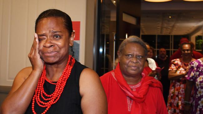 Cynthia Lui (centre) arrives at the victors party with her mother Lizzy Lui.