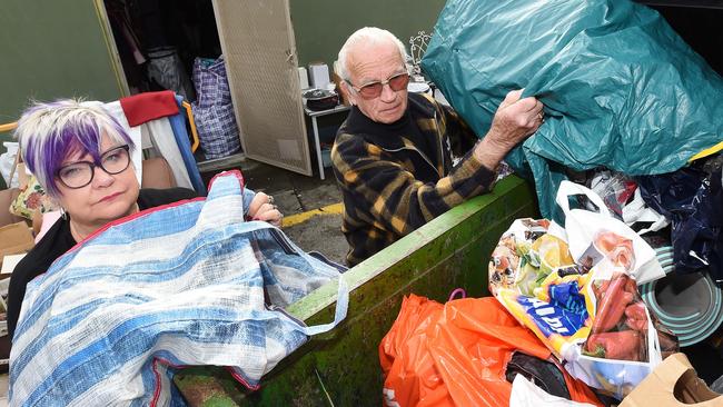 Store manager Sharon Schottler with long time volunteer Les Nahoczki and just some of the junk left by dumpers. Picture: Steve Tanner