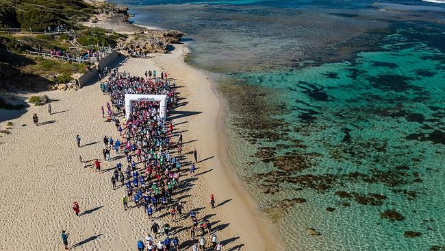 Walk along some of Australia’s most pristine beaches and wild trails, filled with an abundance of colourful wildflowers on the Coastrek Margaret River Route. Picture: Coastrek/Instagram