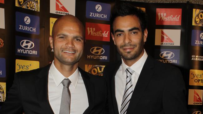 Adelaide United’s golden boot winner Serginho Van Dijk (L) and Johnny Warren Medal winner Marcos Flores at the A-League Awards in Sydney in 2011.