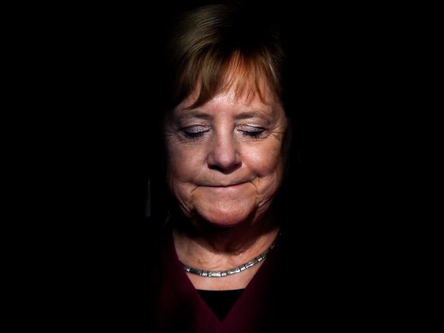 German Chancellor Angela Merkel reacts during a joint press conference with Czech Prime Minister in Prague on October 26, 2018. - The German Chancellor is in Czech Republic as the country celebrates the 100th anniversary of the founding of Czechoslovakia in 1918. (Photo by Michal Cizek / AFP)