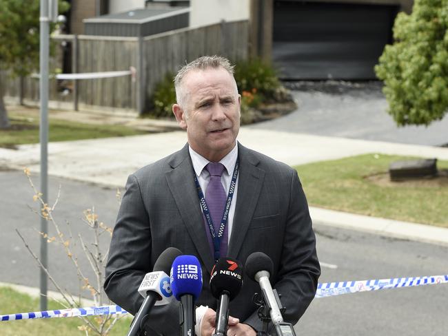 Detective Inspector Chris Murray, of the Arson and Explosives Squad, speaks to the media outside the Truganina property. Picture: Andrew Henshaw