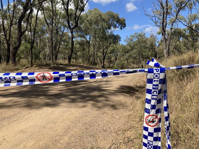 Picture of police tape sealing off Shannonvale Rd about 3km from crime scene which saw Mervyn and Maree Schwarz along with Graham Tighe shot and killed and the wounding of Ross Tighe at Bogie, Central Queensland