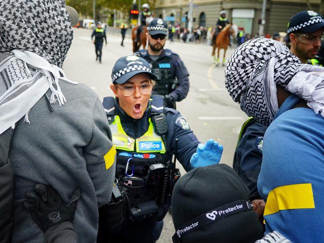 Pro-Israeli protesters had abuse hurled at them. Picture: Luis Enrique Ascui