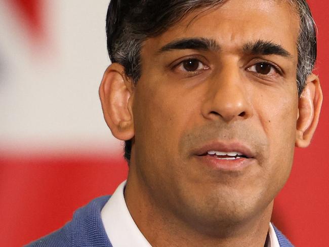 Britain's Prime Minister and Conservative Party Leader Rishi Sunak delivers a speech during a visit to the Well Healthcare Supplies warehouse during a general election campaign event in Stoke-on-Trent, northern England, on July 1, 2024 in the build-up to the UK general election on July 4. (Photo by Dan Kitwood / POOL / AFP)