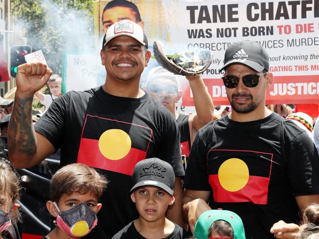 Latrell Mitchell and Cody Walker during the 2020 Invasion Day march from Hyde Park down Elizabeth St, Sydney. The Extinction Rebellion Sydney and Extinction Rebellion Bondi Beach attend in solidarity with the First Nations people. Picture: Jonathan Ng