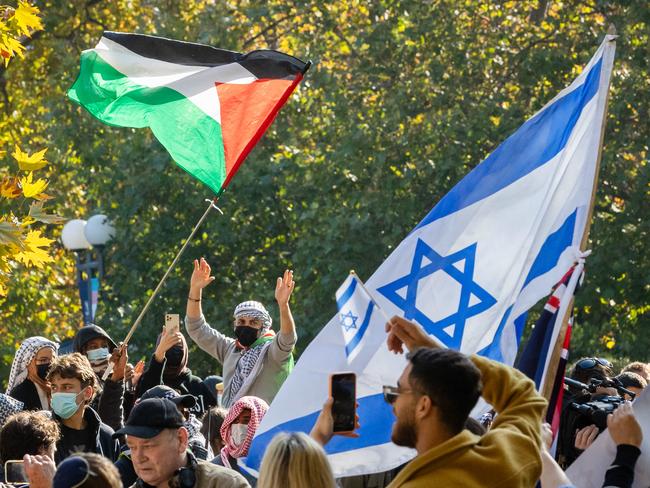 Jewish Israel supporters gather in a park near Melbourne University then walk into the university and face off with Pro Palestine protesters. Picture: Jason Edwards