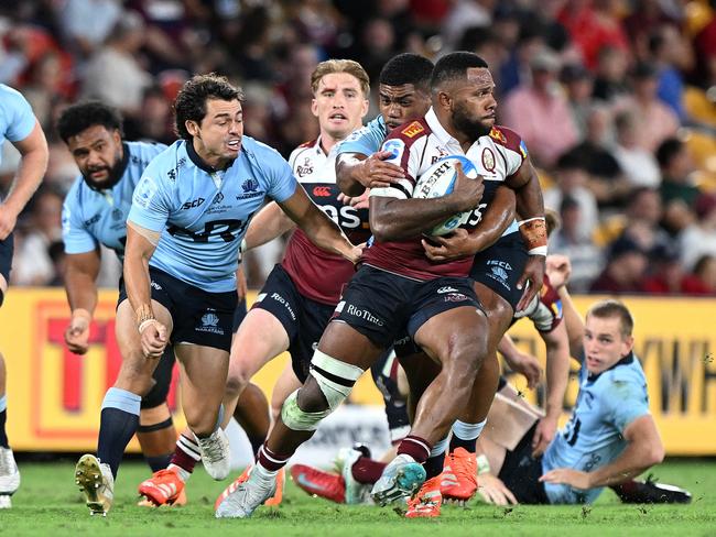 Filipo Daugunu of the Reds breaks away from the defence. Picture: Getty