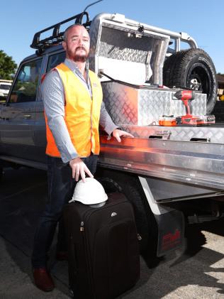 Builder Scott Bishton is considering heading to NSW so his business can survive.Photograph : Jason O'Brien