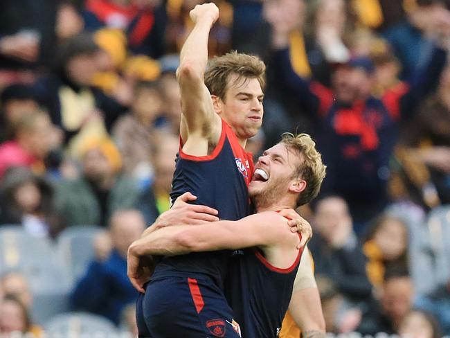 Dom Tyson celebrates the winning goal against Hawthorn with Jack Watts. Picture: Wayne Ludbey