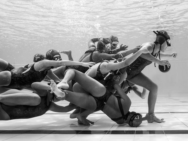 Submerged field ... Everyday aims towards a collective goal. The Colombian national team is immersed in white, gray, and black, fighting together for the ultimate position. With accredited prestige, an invitation was sent to participate in the European Junior underwater rugby Championship, as a guest team. Ana Maria and her team are constantly fighting, pushing their lungs to the limit and transforming their everyday lack of resources to an idea of opportunity. The volume of water suggests calm while the surface gives constant chaos. It is in this scenario that the South American team is named youth world champion winners in Norway. Picture: Camilo Diaz, Colombia, 1st Place, National Awards, 2017 Sony World Photography Awardss
