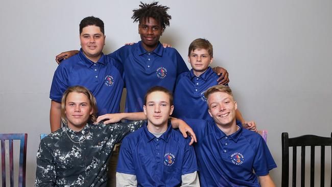 BOOYAH BOYS, from left back Isaiah Amundsen, Vernon Warner-Saylor and Aiden Whatley with front Nicolas Bertoli, Eddie Murphy and Hayden Schocroft during a program graduation at the PCYC in Logan, in 2018. The boys graduated from a program designed to re-engage students and create pathways to school, further education or work. AAP/Jono Searle