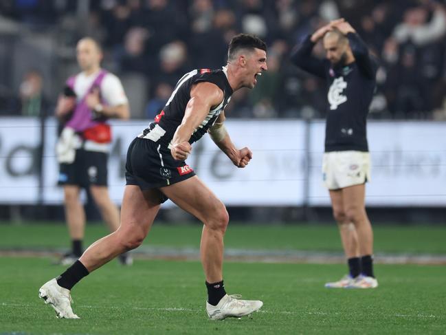 Scott Pendlebury celebrates after the final siren on Saturday night. Picture: Daniel Pockett/Getty Images