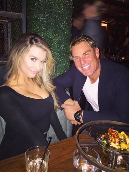 Shane Warne in LA with model Emily Sears.