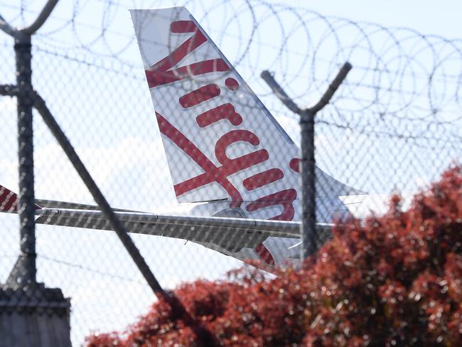 BRISBANE, AUSTRALIA - AUGUST 05: Virgin Australia wide-body aircrafts are seen parked in the Brisbane Airport on August 05, 2020 in Brisbane, Australia. Virgin Australia has announced 3000 job cuts as part of a radical cost reduction strategy for the airline, while its discount provider Tiger Air will close. (Photo by Albert Perez/Getty Images)