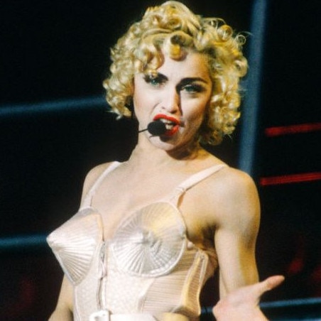 Madonna wearing her cone bra.