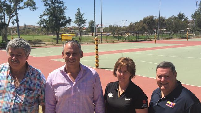 Adam Giles and Damien Ryan with Alice Springs Netball representatives