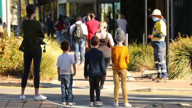 People line up for testing at the Thebarton Community Centre on Monday morning. Picture: Tait Schmaal