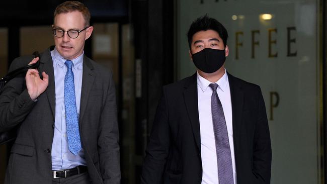 Junchi Ma (right) leaves the Downing Centre courts in Sydney. Picture: NCA NewsWire/Bianca De Marchi