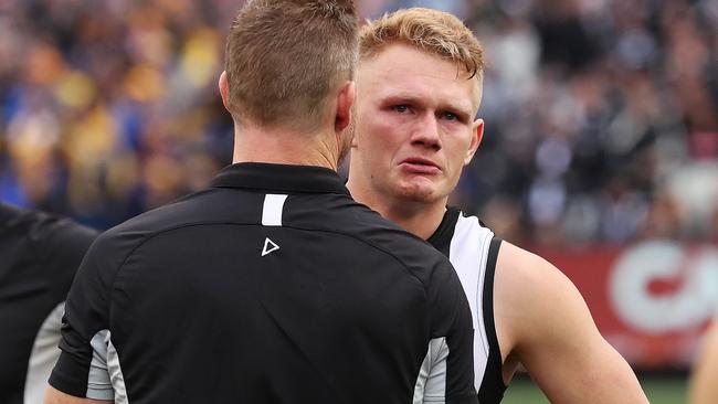 Adam Treloar was consoled by coach Nathan Buckley after the devastating Grand Final loss to West Coast. Picture: Phil Hillyard