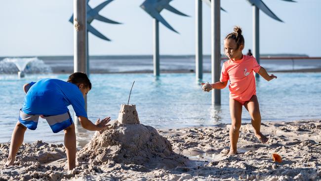 Emlyn and Talon Olsen from Trinity Beach creating a masterpiece by the Lagoon. Picture: Emily Barker.