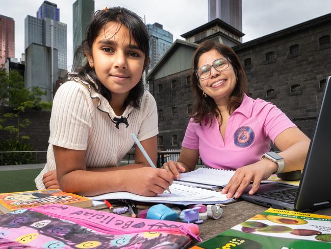 Grade five student 10 year old Belicia Batra with her tutor Reema Verma at RMIT Alumni Courtyard. Picture: Tony Gough