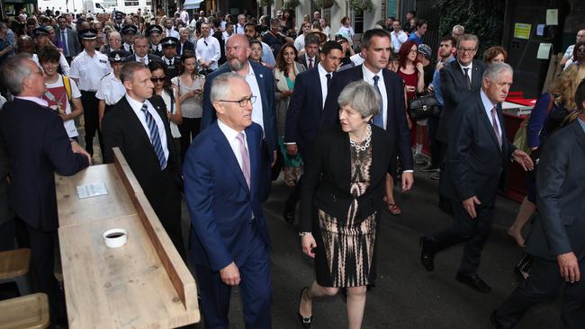 Malcolm Turnbull and Theresa May at Borough Market. Picture: Andrew Meares