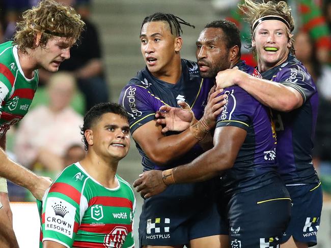 MELBOURNE, AUSTRALIA - MARCH 17: Justin Olam of the Storm celebrates a try during the round two NRL match between the Melbourne Storm and the South Sydney Rabbitohs at AAMI Park, on March 17, 2022, in Melbourne, Australia. (Photo by Kelly Defina/Getty Images)