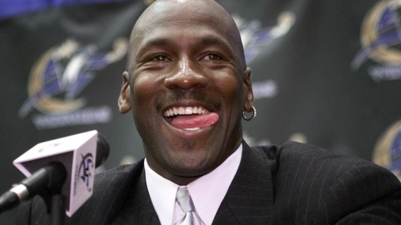  25/09/2001. FILE--Former basketball player Chicago Bulls' Michael Jordan smiles as he answers questions from the media Wednesday, Jan. 19, 2000 at the MCI Center in Washington. Jordan made his comeback official announcing he will return to play in the NBA and sign a two-year contract with the Washington Wizards. ``I am returning as a player to the game I love', said Jordan, 38 and more than three years removed from what seemed to be a storybook ending to his career. (AP Photo/Pablo Martinez Monsivais) 