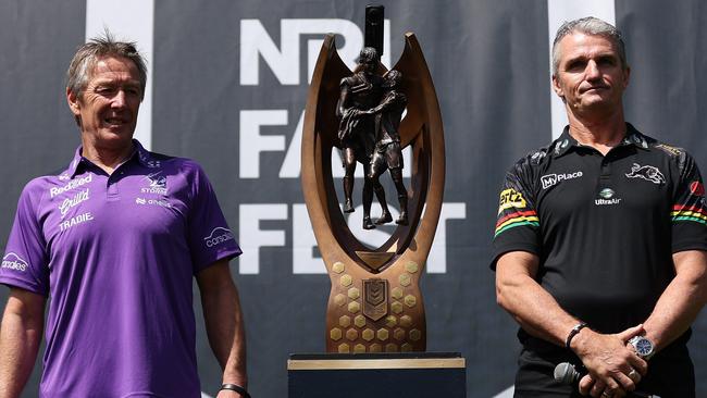 SYDNEY, AUSTRALIA - OCTOBER 03: Craig Bellamy, coach of the Storm and Ivan Cleary, coach of the Panthers pose alongside the Provan-Summons Trophy during NRL Grand Final Fan Fest at Overseas Passenger Terminal, on October 03, 2024, in Sydney, Australia. (Photo by Brendon Thorne/Getty Images)