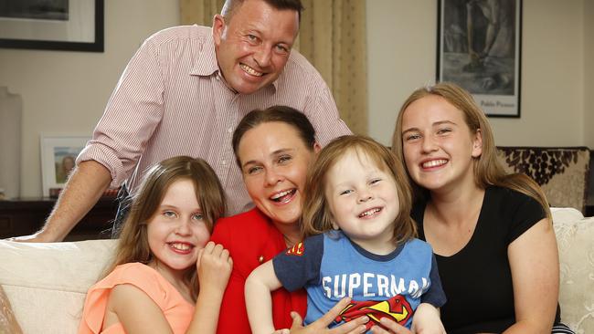 Jane Garrett with husband James Higgins and their children Sasha, Max, and Molly. Picture: David Caird