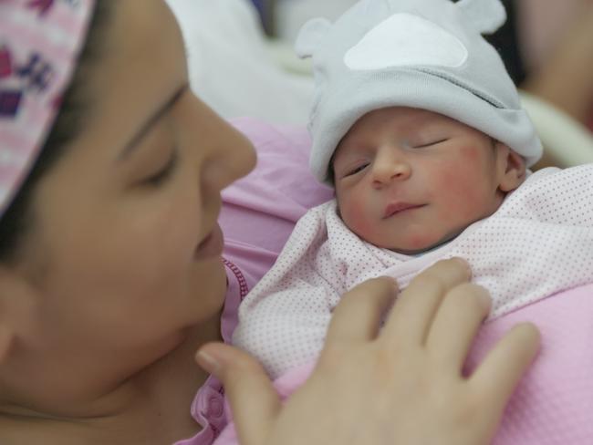 Generic photo of a mother and baby in hospital.  A newborn baby enters the world and mother holding newborn baby girl in the hospital.    Picture: iStock