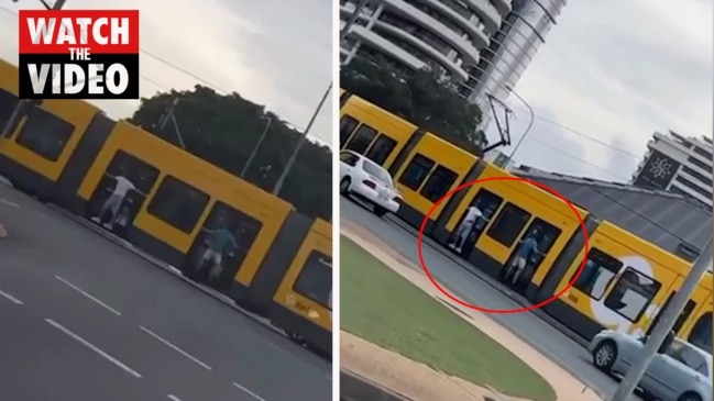 Thrillseekers illegally cling to tram on Gold Coast