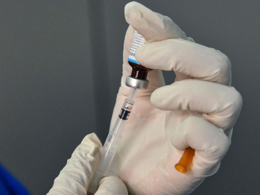 Medical staff prepares vaccine for tuberculosis at a community health centre in Banda Aceh. 1.5 million people died of TB last year and cases are rising. Picture: AFP