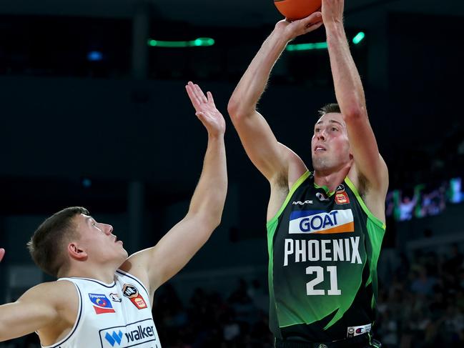 MELBOURNE, AUSTRALIA - FEBRUARY 02: Joe Wieskamp of the Phoenix shoots over Dejan Vasiljevic of the 36ers during the round 19 NBL match between South East Melbourne Phoenix and Adelaide 36ers at John Cain Arena, on February 02, 2025, in Melbourne, Australia. (Photo by Josh Chadwick/Getty Images)